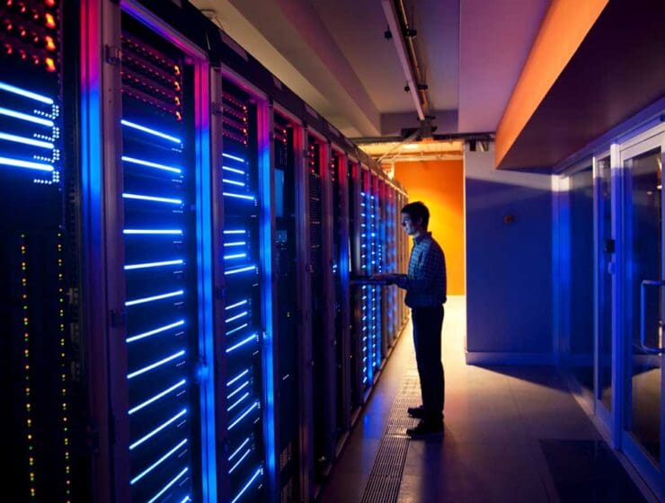 man in data center in dark
