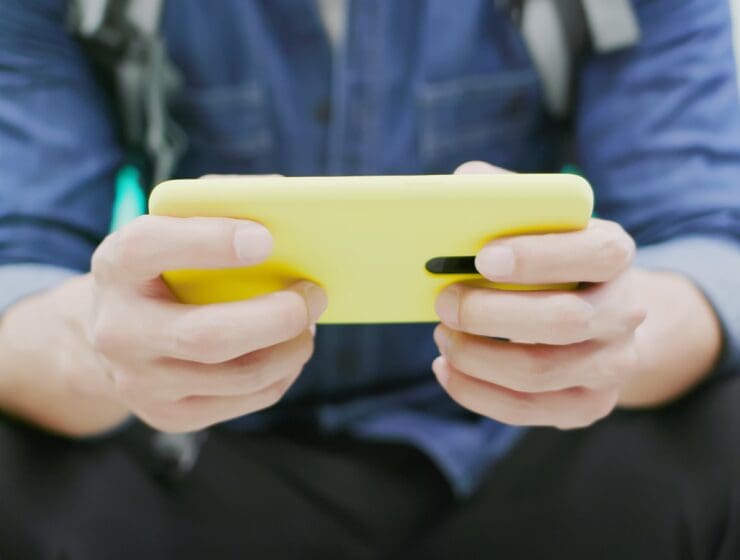 person playing game on phone